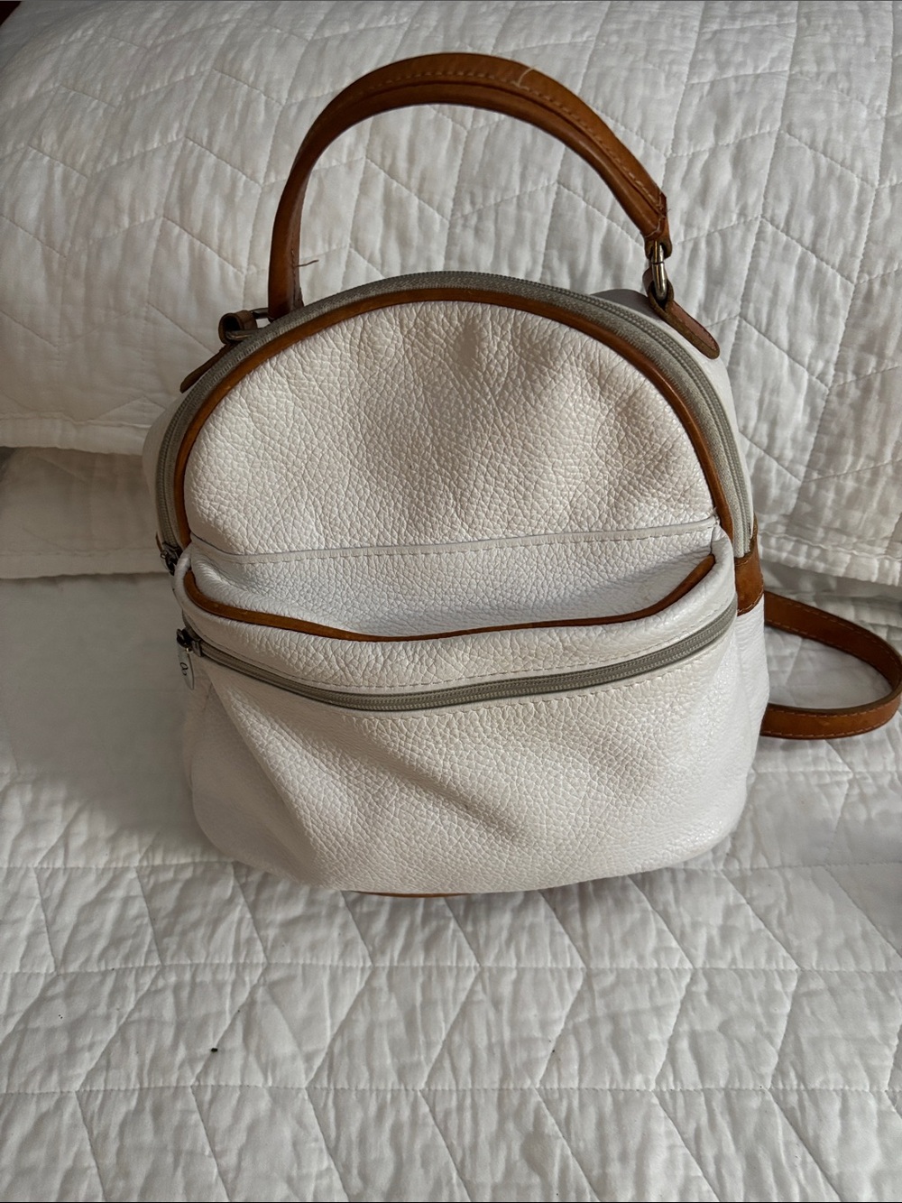 Compact White Pebbled Leather Backpack with Tan Trim